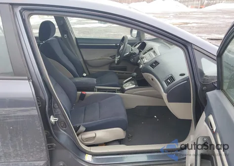 2009 Honda Civic Hybrid from USA, damaged, VIN JHMFA362X9S010374